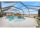 Relaxing pool area with screened enclosure at 16253 Cape Horn Blvd, Punta Gorda, FL 33955