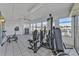 Home gym with exercise machines and canal view at 1640 Montia Ct, Punta Gorda, FL 33950