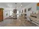 Sunlit living room with a work area and eclectic design elements at 1640 Montia Ct, Punta Gorda, FL 33950