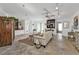 Living room with a sofa and antique cabinet, offering an open floor plan at 1640 Montia Ct, Punta Gorda, FL 33950