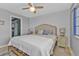 Main bedroom with king bed and ensuite bathroom access at 1640 Montia Ct, Punta Gorda, FL 33950