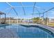 Relaxing screened-in pool with canal views at 1640 Montia Ct, Punta Gorda, FL 33950