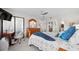 Spacious bedroom with a dresser and a view from the window at 175 Kings Hwy # 738, Punta Gorda, FL 33983