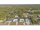 Aerial view of residential neighborhood with lush greenery at 18266 Grace Ave, Port Charlotte, FL 33948