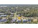 Aerial view of a house and surrounding neighborhood at 18266 Grace Ave, Port Charlotte, FL 33948