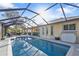 Large screened in pool with plenty of room for entertaining at 18266 Grace Ave, Port Charlotte, FL 33948