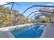 Relaxing screened pool and patio area at 18266 Grace Ave, Port Charlotte, FL 33948