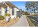 Sidewalk leading to the back of the house at 18266 Grace Ave, Port Charlotte, FL 33948