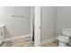 Clean bathroom with toilet and shower, featuring modern finishes at 18322 Garman Ave, Port Charlotte, FL 33948