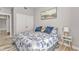 Bedroom with a full-size bed and coastal decor at 18322 Garman Ave, Port Charlotte, FL 33948