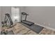 Well-equipped home gym with treadmill, weights, and plenty of space at 18322 Garman Ave, Port Charlotte, FL 33948