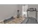 Well-equipped home gym with treadmill, weights, and plenty of space at 18322 Garman Ave, Port Charlotte, FL 33948