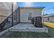 Covered patio with grill and pavers at 18322 Garman Ave, Port Charlotte, FL 33948