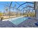 Enjoy this refreshing screened pool at 18322 Garman Ave, Port Charlotte, FL 33948