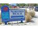 Nokomis Beach access sign with amenities listed at 1839 Settlers Dr # B-6, Nokomis, FL 34275