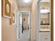 Clean hallway with access to bedroom and bathroom at 1839 Settlers Dr # B-6, Nokomis, FL 34275