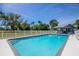 Refreshing community pool with a relaxing patio at 1839 Settlers Dr # B-6, Nokomis, FL 34275