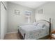 Bright bedroom with a king-size bed and ensuite access at 19119 Mangieri St, Venice, FL 34293