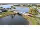 Picturesque bridge over calm waters in a community at 19119 Mangieri St, Venice, FL 34293