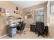 Bright home office featuring a desk, chair, and ample natural light at 19119 Mangieri St, Venice, FL 34293