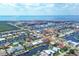 Aerial view of waterfront home in a residential community at 195 Bayshore Ct, Punta Gorda, FL 33950