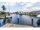 Scenic view of a canal with boats and waterfront homes at 195 Bayshore Ct, Punta Gorda, FL 33950