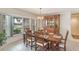 Elegant dining room with a large table and hutch at 195 Bayshore Ct, Punta Gorda, FL 33950