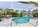 Refreshing kidney-shaped pool with screened patio at 195 Bayshore Ct, Punta Gorda, FL 33950