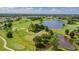 Golf course with lake and lush landscaping at 2100 Kings Hwy # 100, Port Charlotte, FL 33980