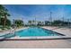 Inviting rectangular pool with plenty of lounge chairs at 2100 Kings Hwy # 100, Port Charlotte, FL 33980