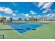 Two well-maintained tennis courts at 2100 Kings Hwy # 100, Port Charlotte, FL 33980