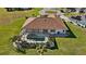 Aerial view of the house, highlighting the pool and backyard at 2210 Bengal Ct, Punta Gorda, FL 33983