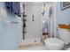 Bathroom with walk-in shower and nautical-themed shower curtain at 2210 Bengal Ct, Punta Gorda, FL 33983