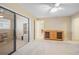 Spacious bonus room with built-in shelving and access to other rooms at 2427 St Davids Island Ct, Punta Gorda, FL 33950