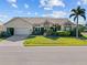 Single-Gathering home with attached garage and landscaping at 2427 St Davids Island Ct, Punta Gorda, FL 33950