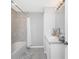 Clean bathroom with white vanity, shower, and tub at 25896 Prada Dr, Punta Gorda, FL 33955