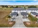 Two-story condo building with attached garages and ample parking at 26316 Nadir Rd # A2, Punta Gorda, FL 33983