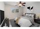 Bright bedroom with a comfortable bed and modern decor at 26316 Nadir Rd # A2, Punta Gorda, FL 33983