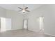 Light and airy bedroom with wood-look floors and access to the backyard at 27072 Ecuador Dr, Punta Gorda, FL 33983