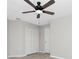 Well lit bedroom with ceiling fan and large closet at 27072 Ecuador Dr, Punta Gorda, FL 33983