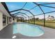 Refreshing screened pool with canal view at 27072 Ecuador Dr, Punta Gorda, FL 33983