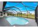 Relaxing screened pool with canal view at 27072 Ecuador Dr, Punta Gorda, FL 33983