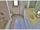 Small bathroom with single vanity and shower/tub combo at 27446 Pasto Dr, Punta Gorda, FL 33983