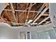 Ceiling with exposed wooden beams and water damage at 27446 Pasto Dr, Punta Gorda, FL 33983