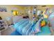 Bedroom with king-size bed and coastal themed decor at 311 Garvin St # 401A, Punta Gorda, FL 33950