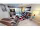 Living room featuring comfortable seating and large TV at 311 Garvin St # 401A, Punta Gorda, FL 33950