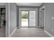 Laundry Room with sliding glass door leading to backyard at 3112 Magnolia Way, Punta Gorda, FL 33950