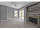 Living room with hardwood floors, fireplace, and sliding glass doors at 3112 Magnolia Way, Punta Gorda, FL 33950