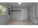 Storage or workshop area with overhead shelving at 3112 Magnolia Way, Punta Gorda, FL 33950