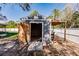 Gray shed with covered porch and ramp access at 3214 Amanda St, Punta Gorda, FL 33950